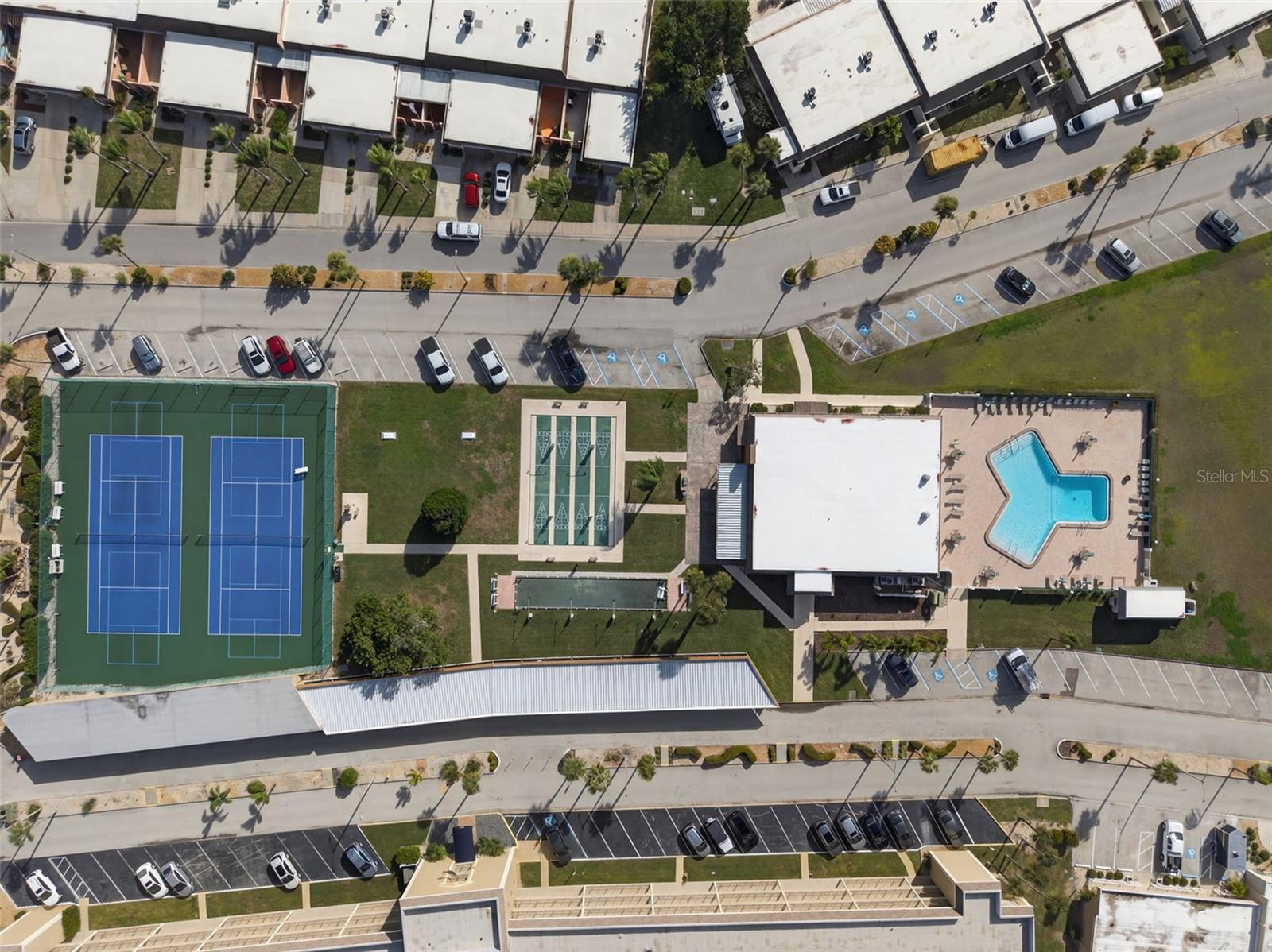 Community tennis and shuffleboard courts, swimming pool, and club house with fitness center.