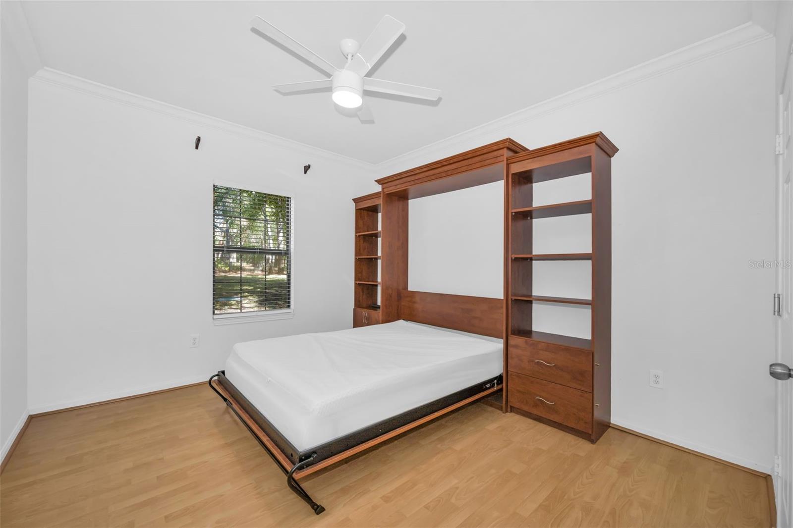 HIGH-END QUEEN SIZE MURPHY BED IN GUEST BEDROOM