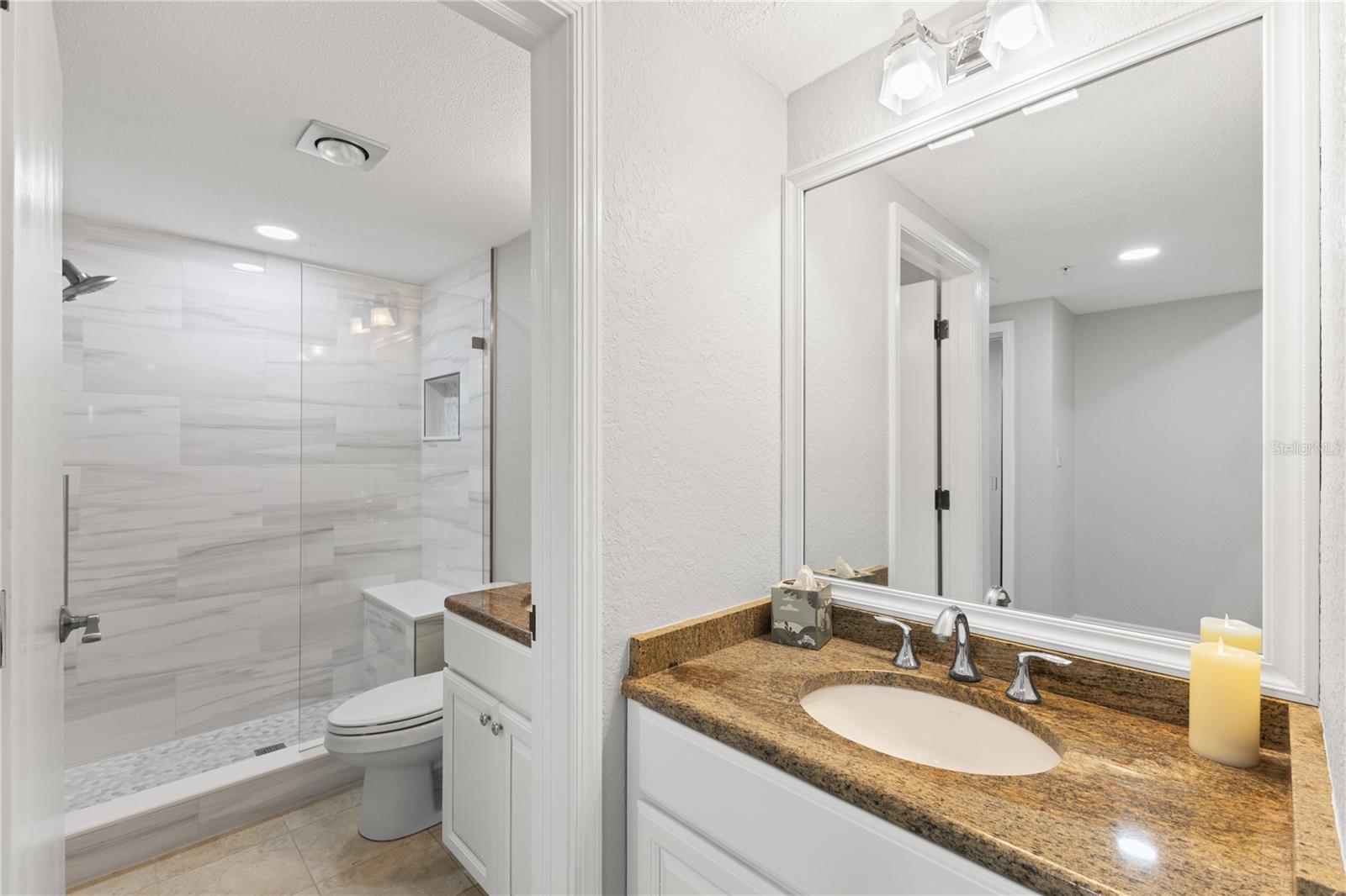 Master with double sinks and brand new walk in shower and shower custom door