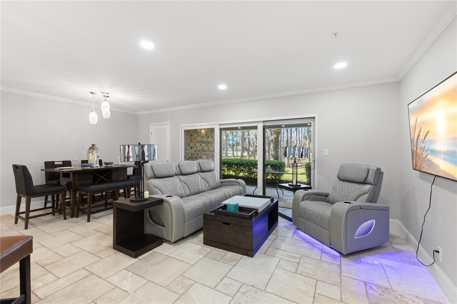 Living room/dining table, entrance to Patio