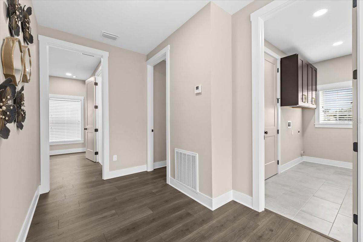 Upstairs Laundry room to the right if the stairs