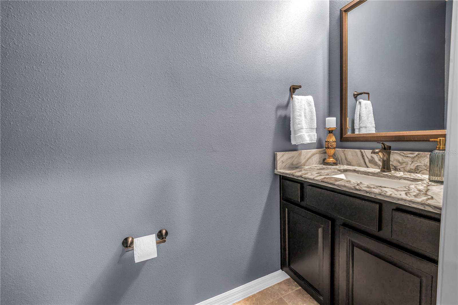 Powder bath with upgraded vanity & granite