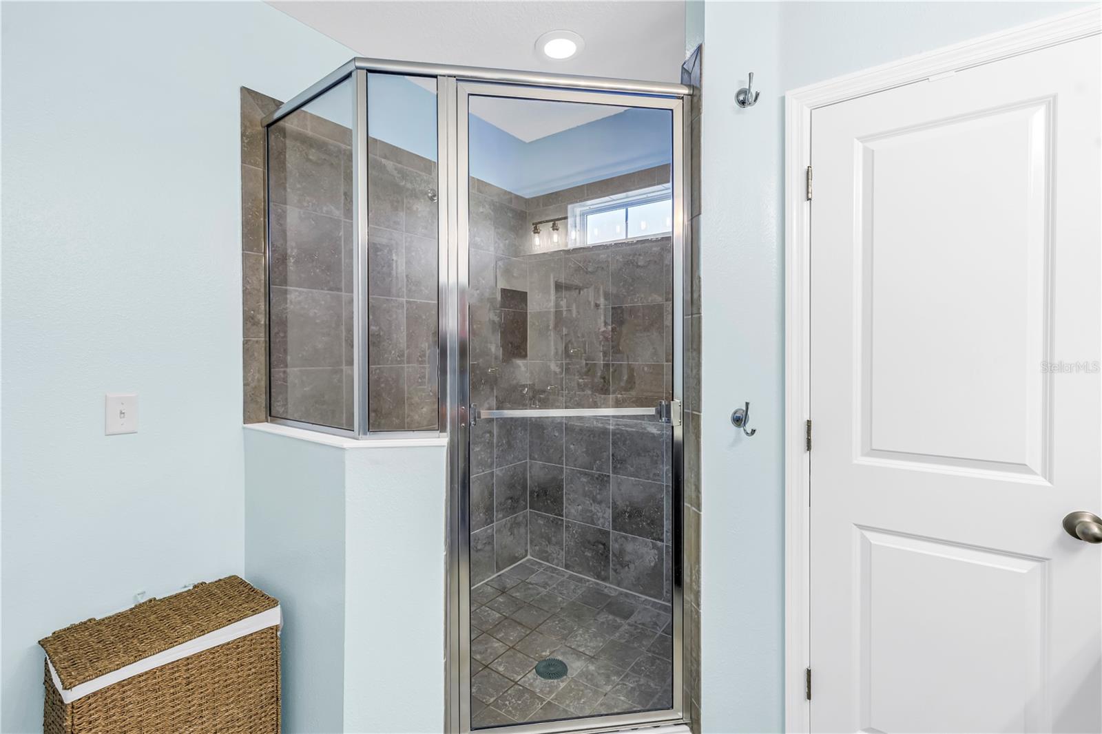Glass walk-in shower in main bath