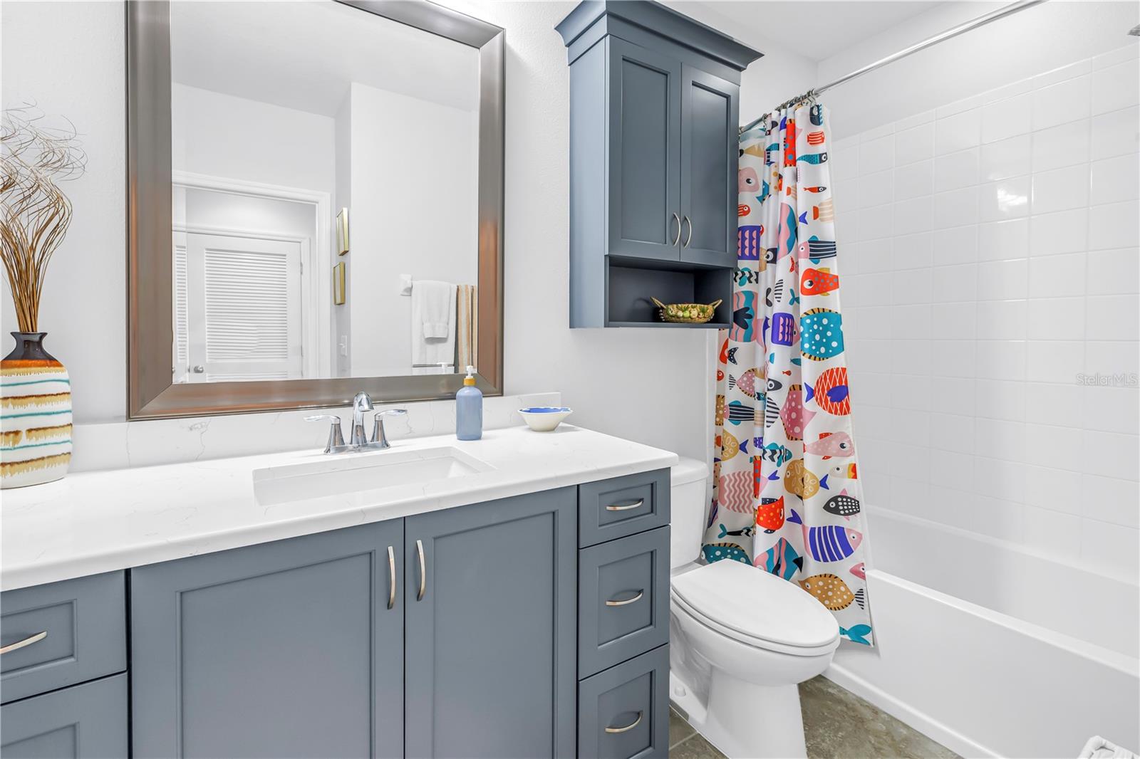 Hall bathroom with tub shower