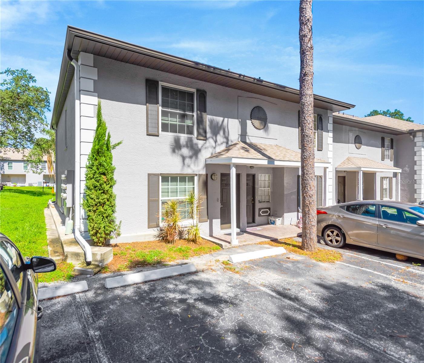 Front of unit ~ 5170 Sunridge Palms.  Private entrance with front of unit parking.