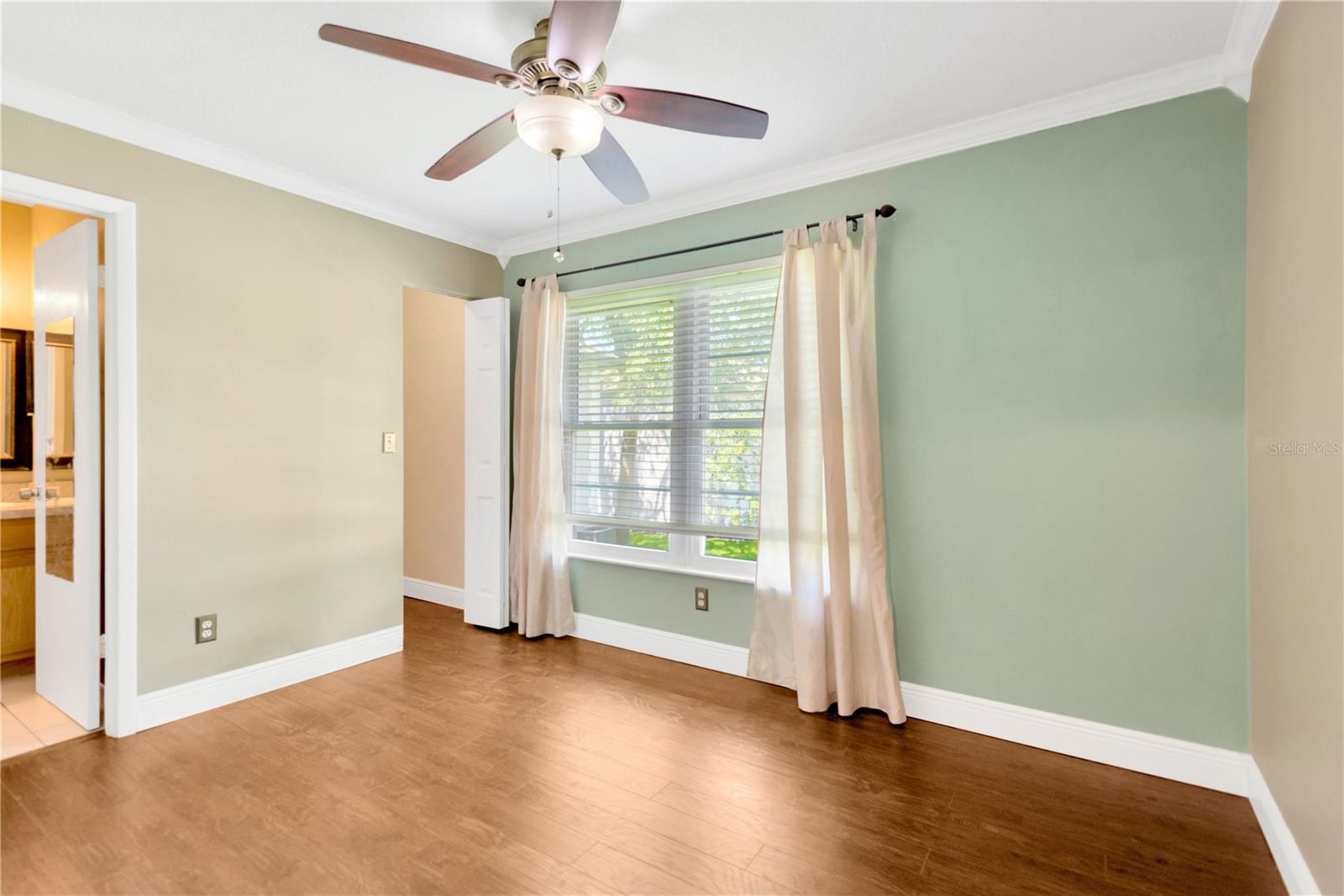 Primary Suite with its own private bath.  Currently being used as an in-home workout space.