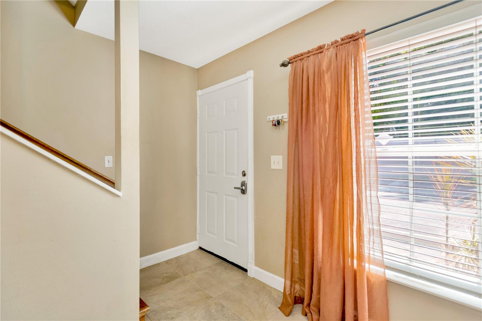 Welcome to your new home.  Light and bright ~ front window provides an abudance of natural light.  Easy care tile floors, neutral wall colors allow you to add your touch of color to make this home your own.