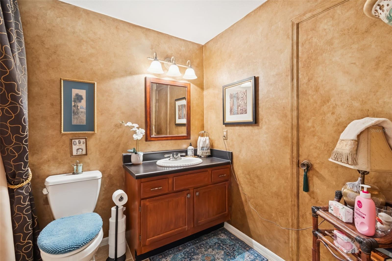 Guest Bath With Door to Downstairs Primary Bedroom/Den