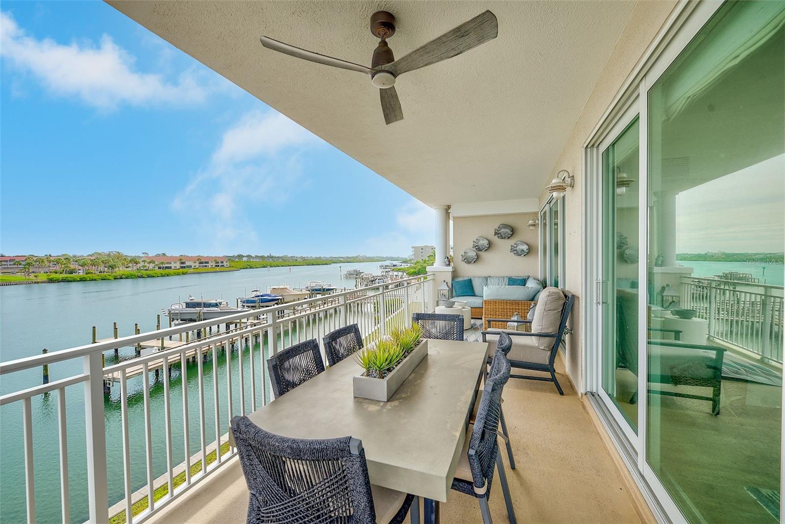Outdoor dining, relaxation and wide, waterfront views.