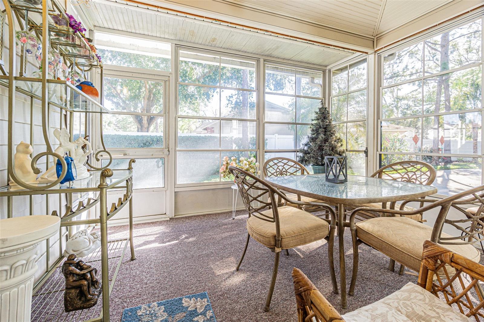 Wonderful screened porch with full windows to stay warm in the winter.