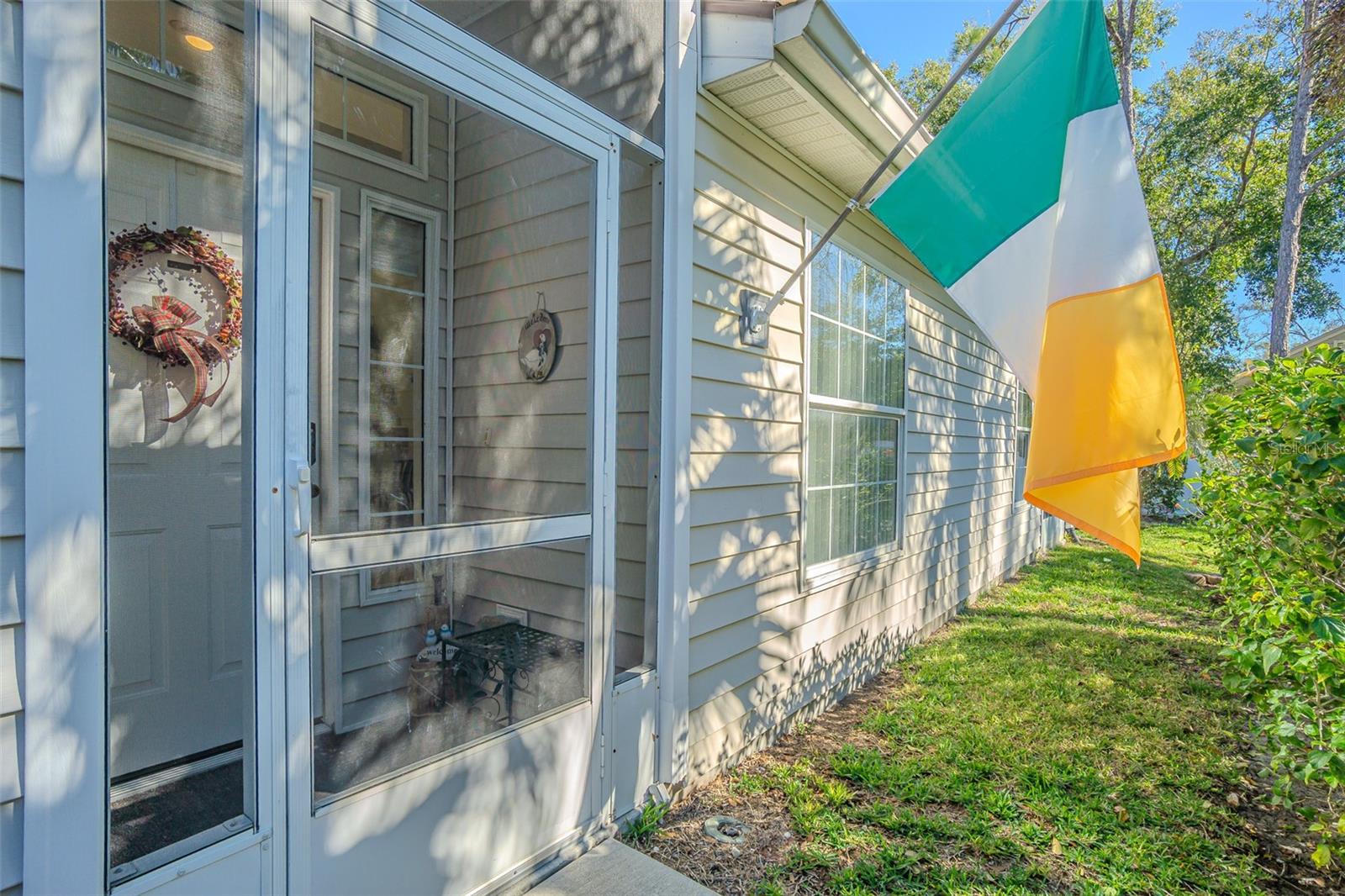 Screened entry porch.