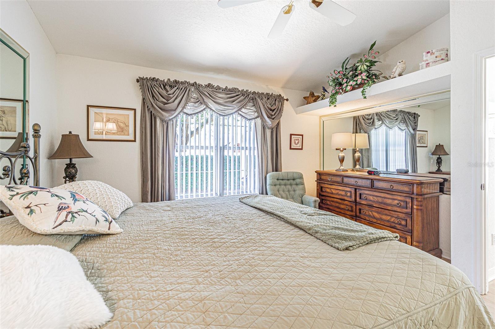 Primary bedroom also has plant shelves for decorating.