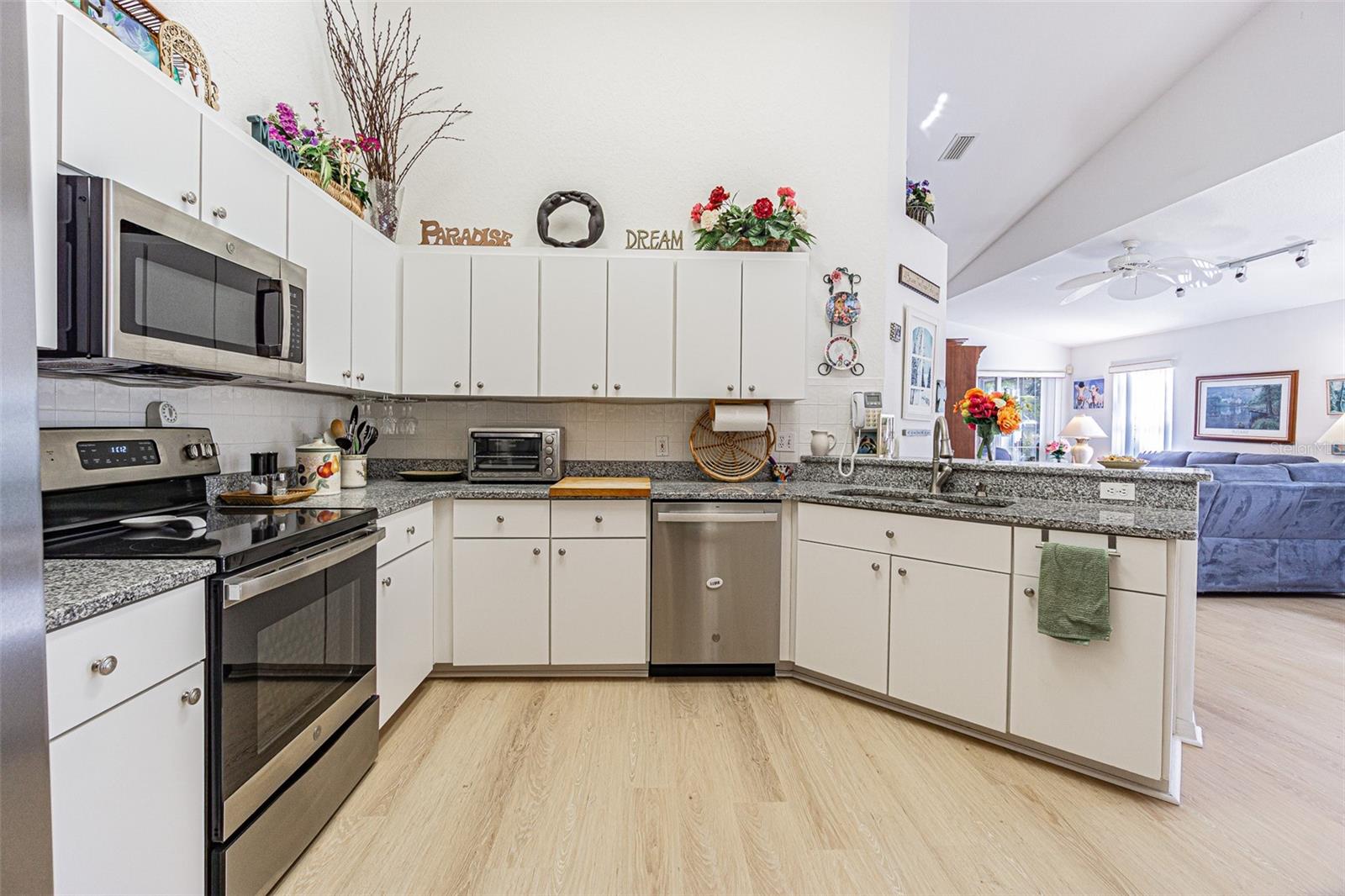 Granite countertop, SS appliances, breakfast bar and cathedral ceilings!