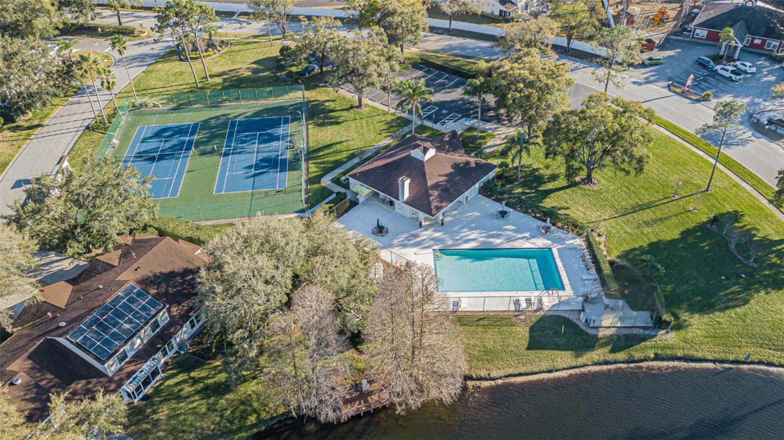 Clubhouse, pool, tennis/pickleball courts.