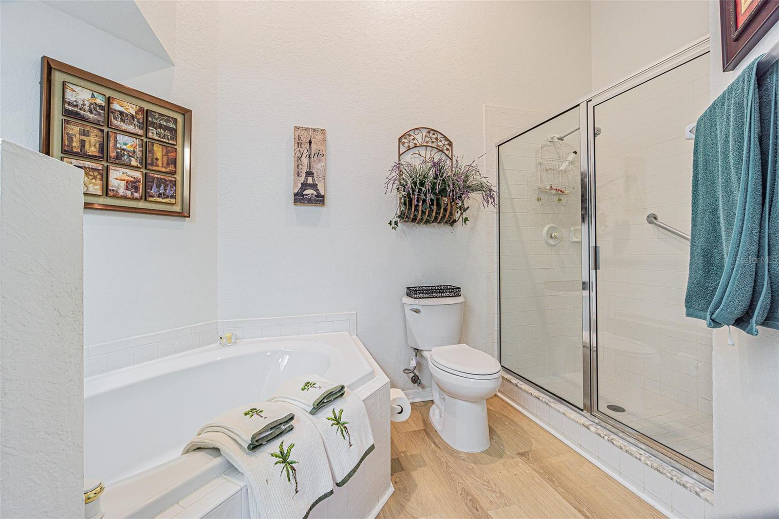 Primary bath with huge soaking tub and separate shower.
