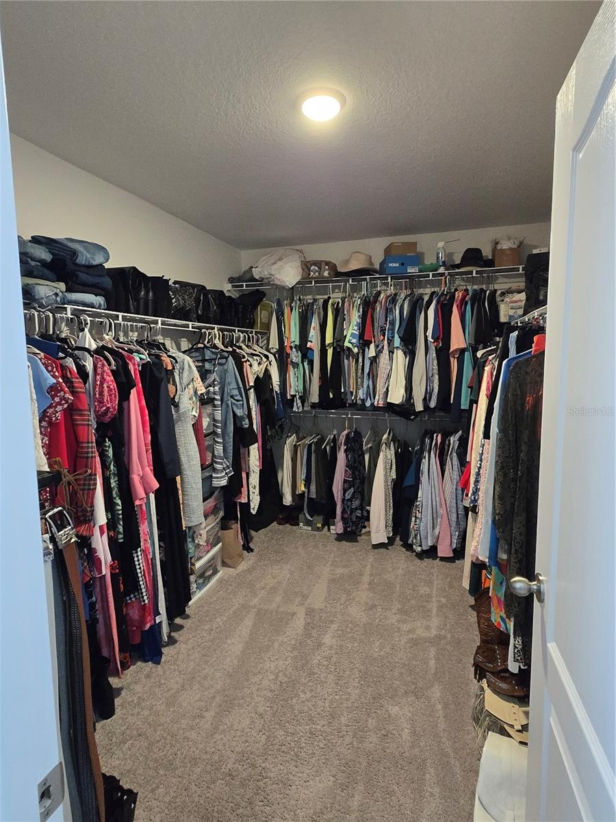 Primary walk-in closet