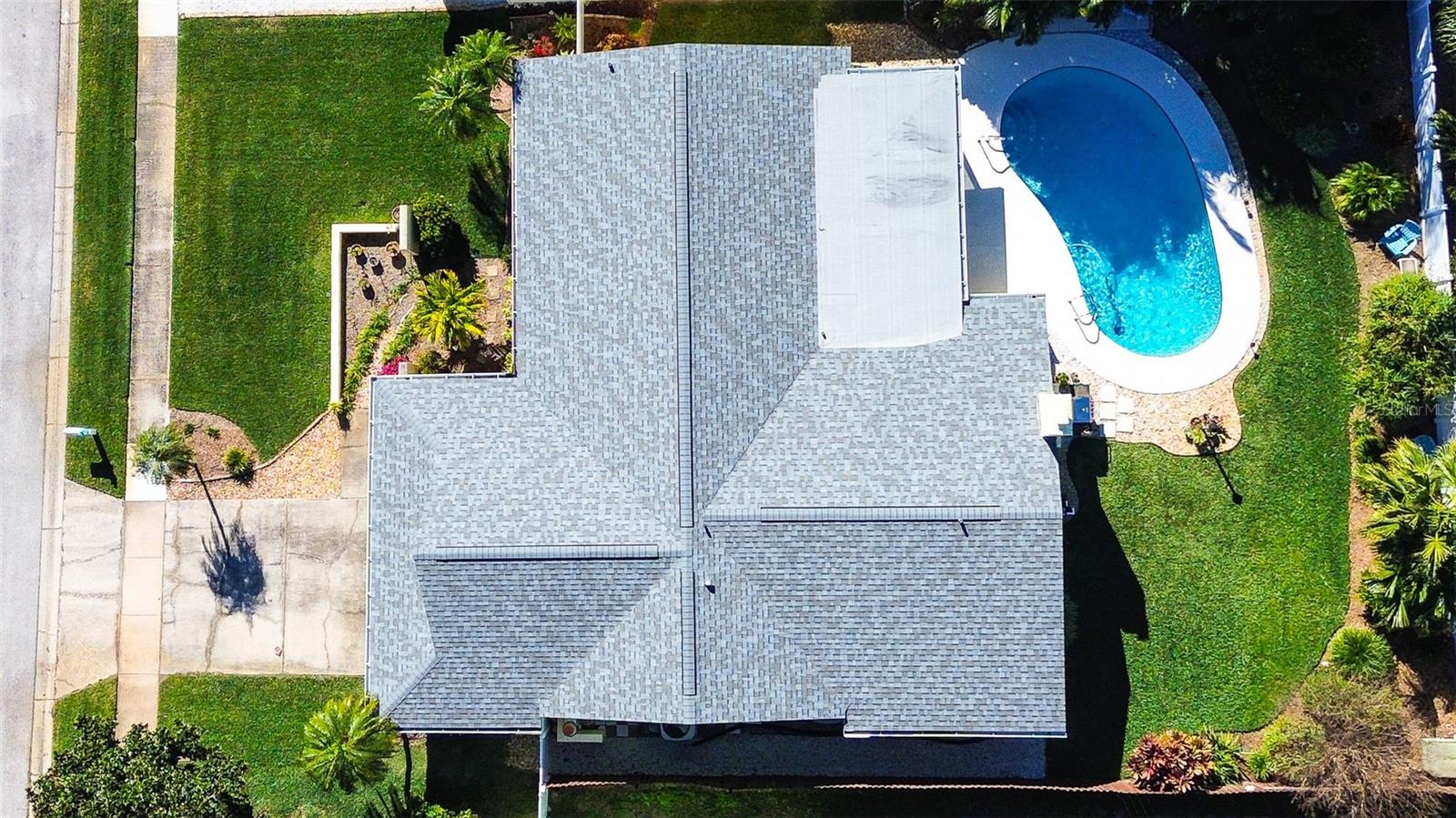 Aerial View of House and Pool