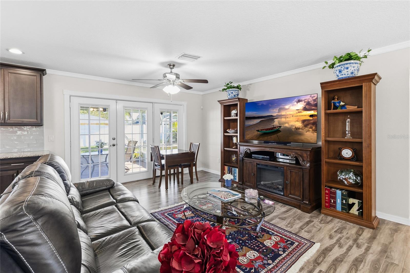 Cloer view of great room, nook area going to the screened/covered porch.