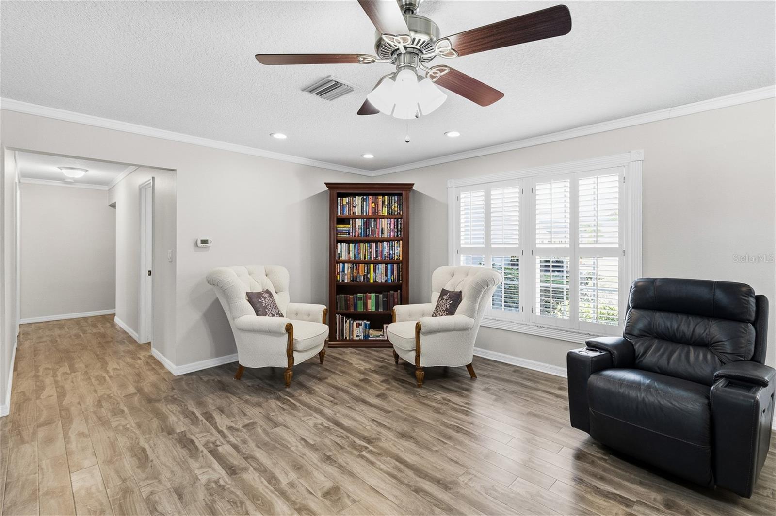 Part of the great room looking toward the hallway.