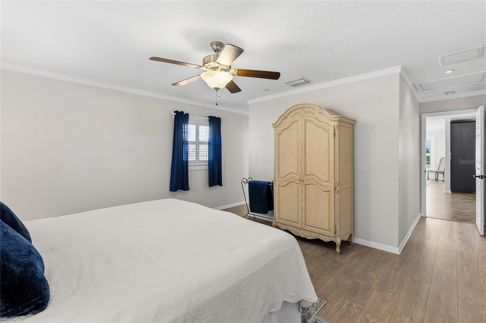 Primary suite ensuite bath to left, door to right.