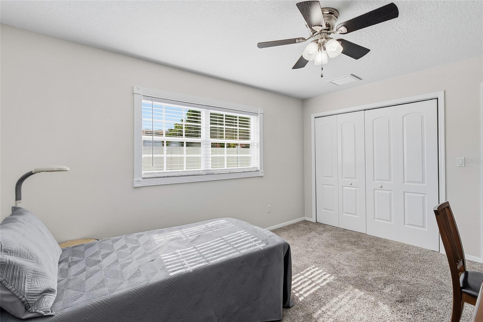 Bedroom 3 looking towards spacious closet.