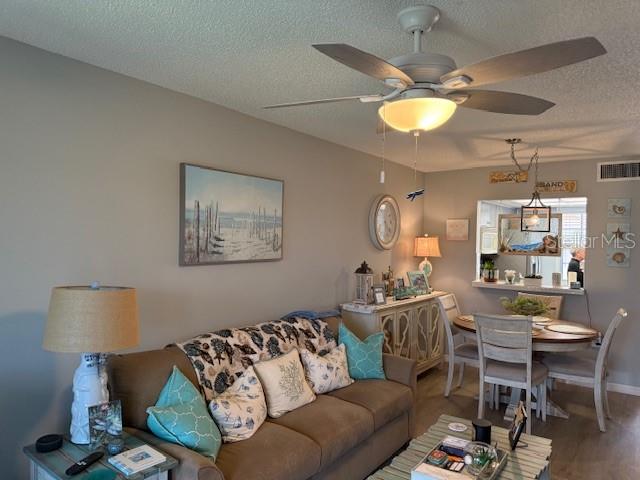 UPDATED CEILING FANS.  KITCHEN PASS THROUGH