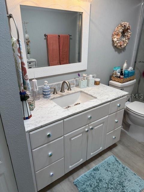 CABINET WITH LOTS OF STORAGE + LINEN CLOSE IN BATHROOM.