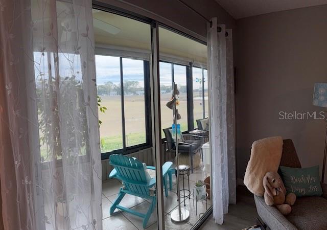 2 DOUBLE SLIDERS TO ACCESS THE ENCLOSED FLORIDA ROOM.