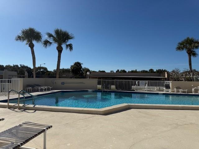 THIS IS THE CONDO POOL FOR ONLY THE CONDO OWNERS.  THIS  IS IN ADDITION TO THE MAIN CLUBHOUSE POOL.  THIS POOL IS STEPS AWAY FROM YOUR FRONT DOOR.