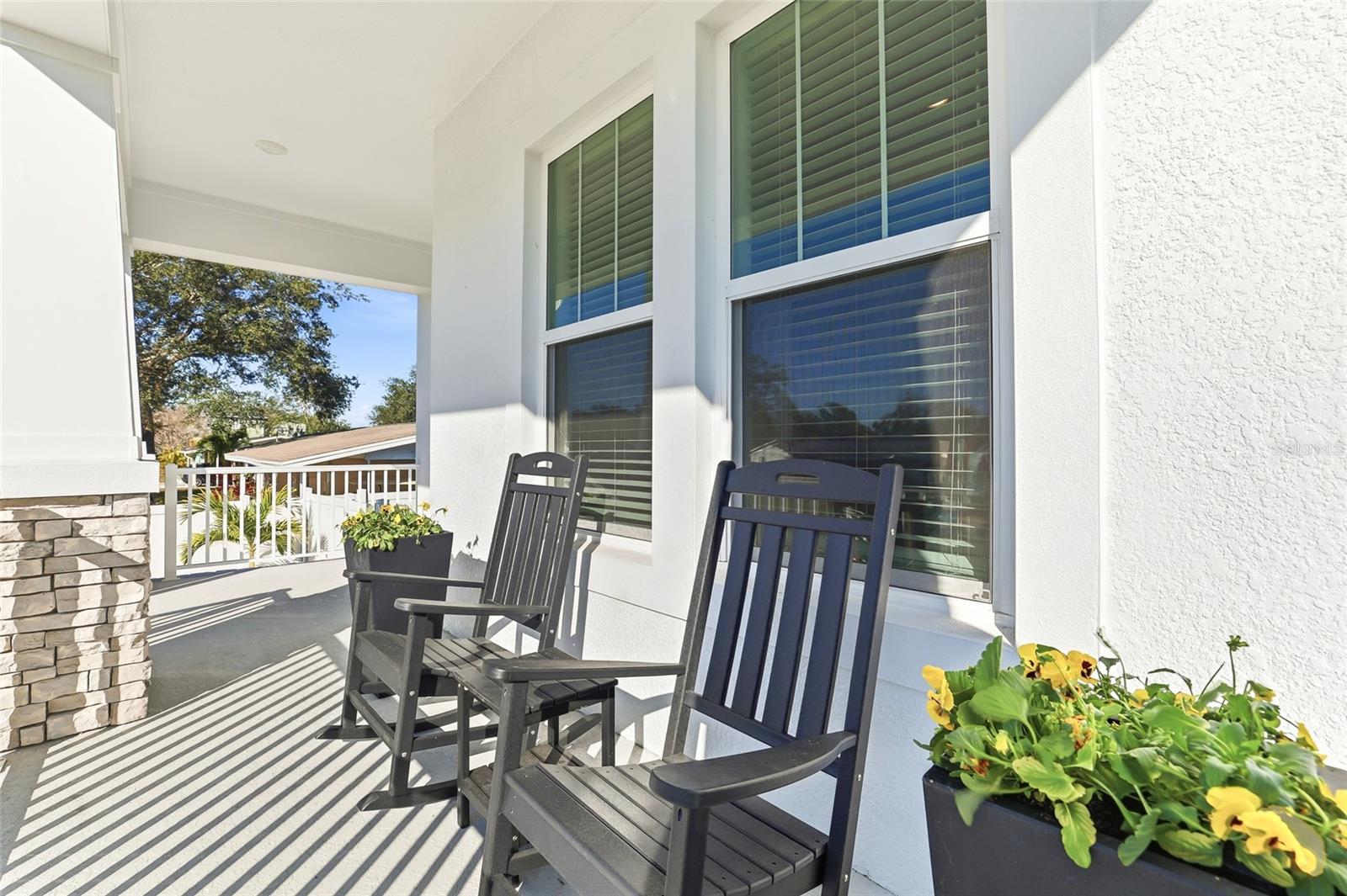 Gorgeous southern-style porch to relax, catch up with neighbors and wave to the bicyclists and neighborhood walkers.