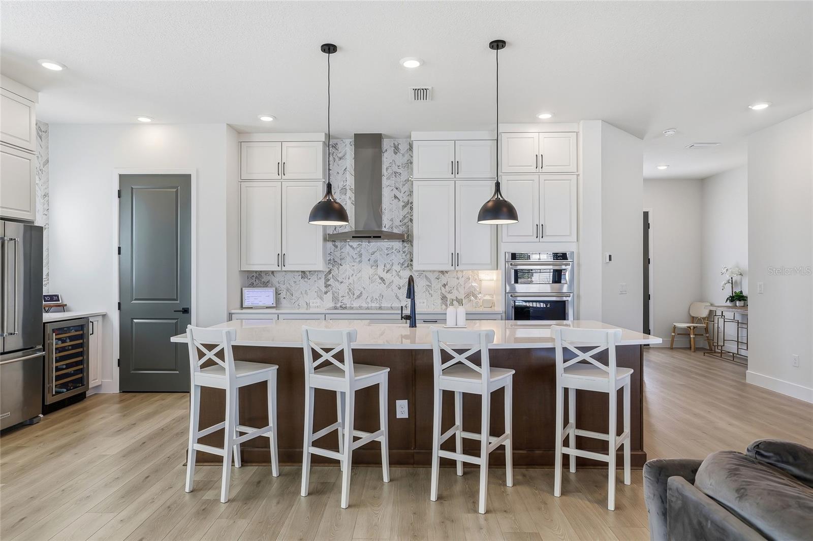 Picture-perfect gourmet kitchen that flows seamlessly with the living room and dining.