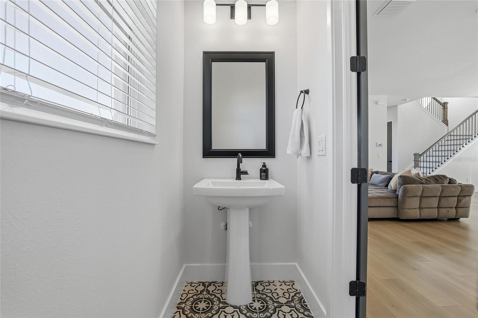 Half bath directly off the living room.