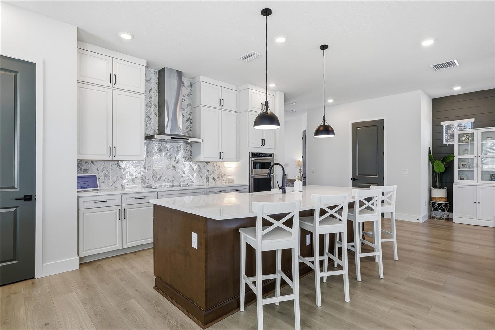 Floor to ceiling cabinets to store all your dishware and appliances.