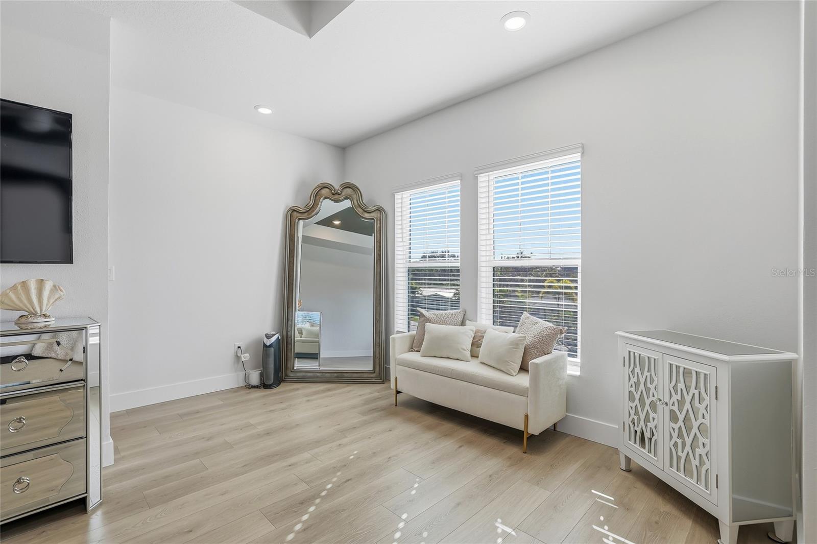 The primary is so large, you have plenty of space for a sitting area or study.