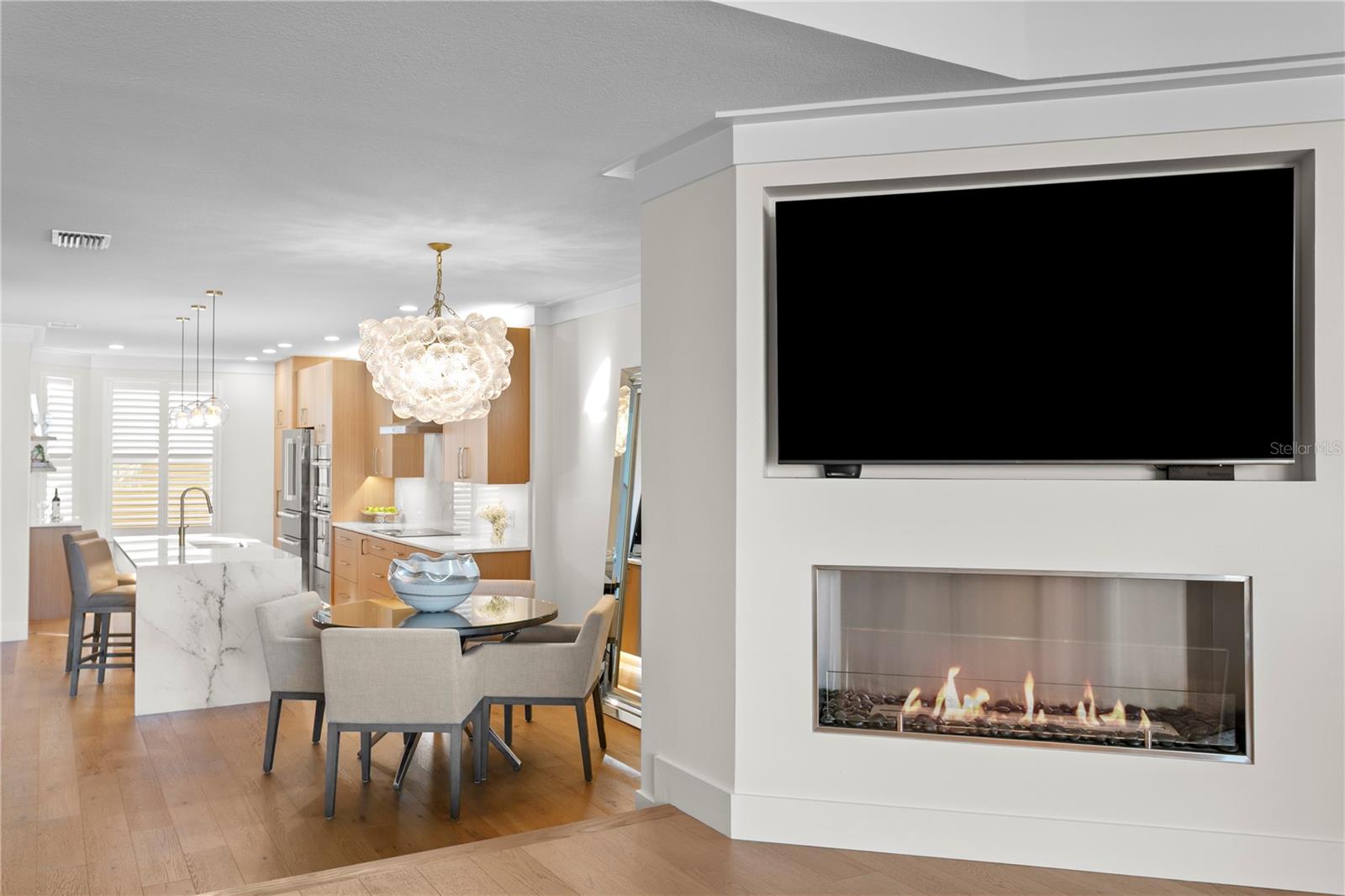 Fireplace, Dining area leading into kitchen