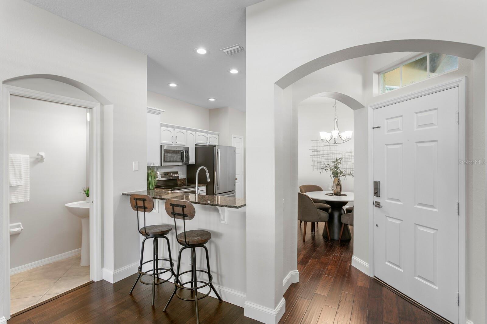 BREAKFAST BAR - EXTERIOR FRONT DOOR FROM INSIDE