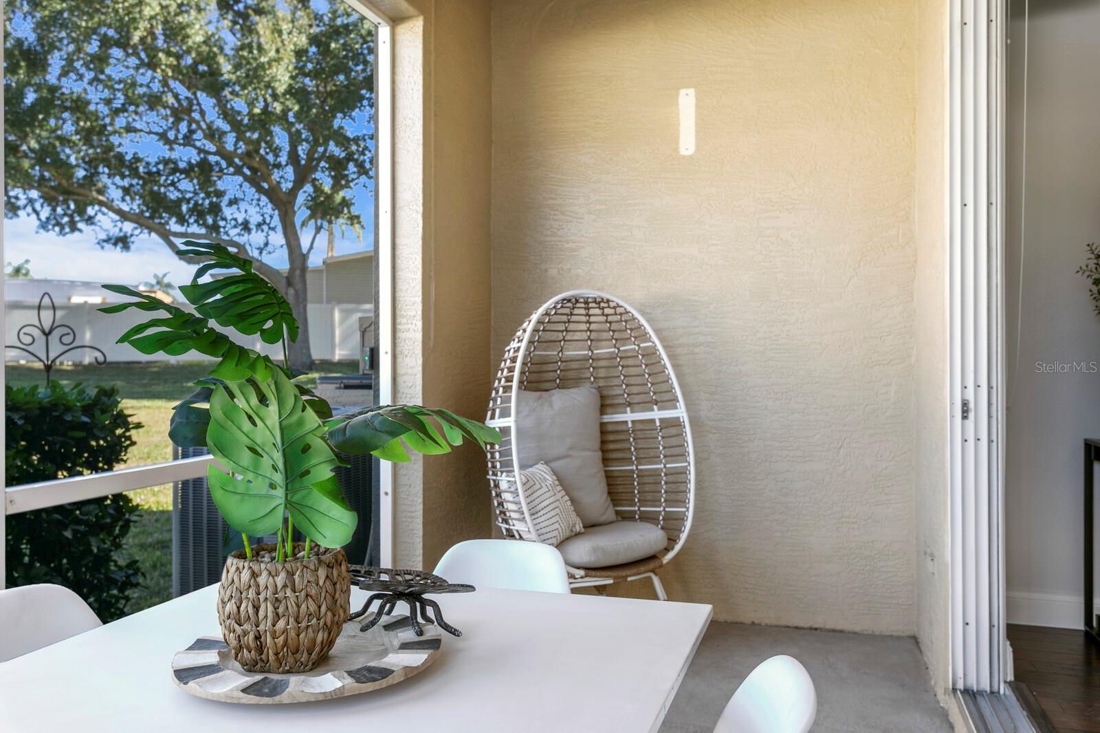 SCREENED-IN COVERED PATIO