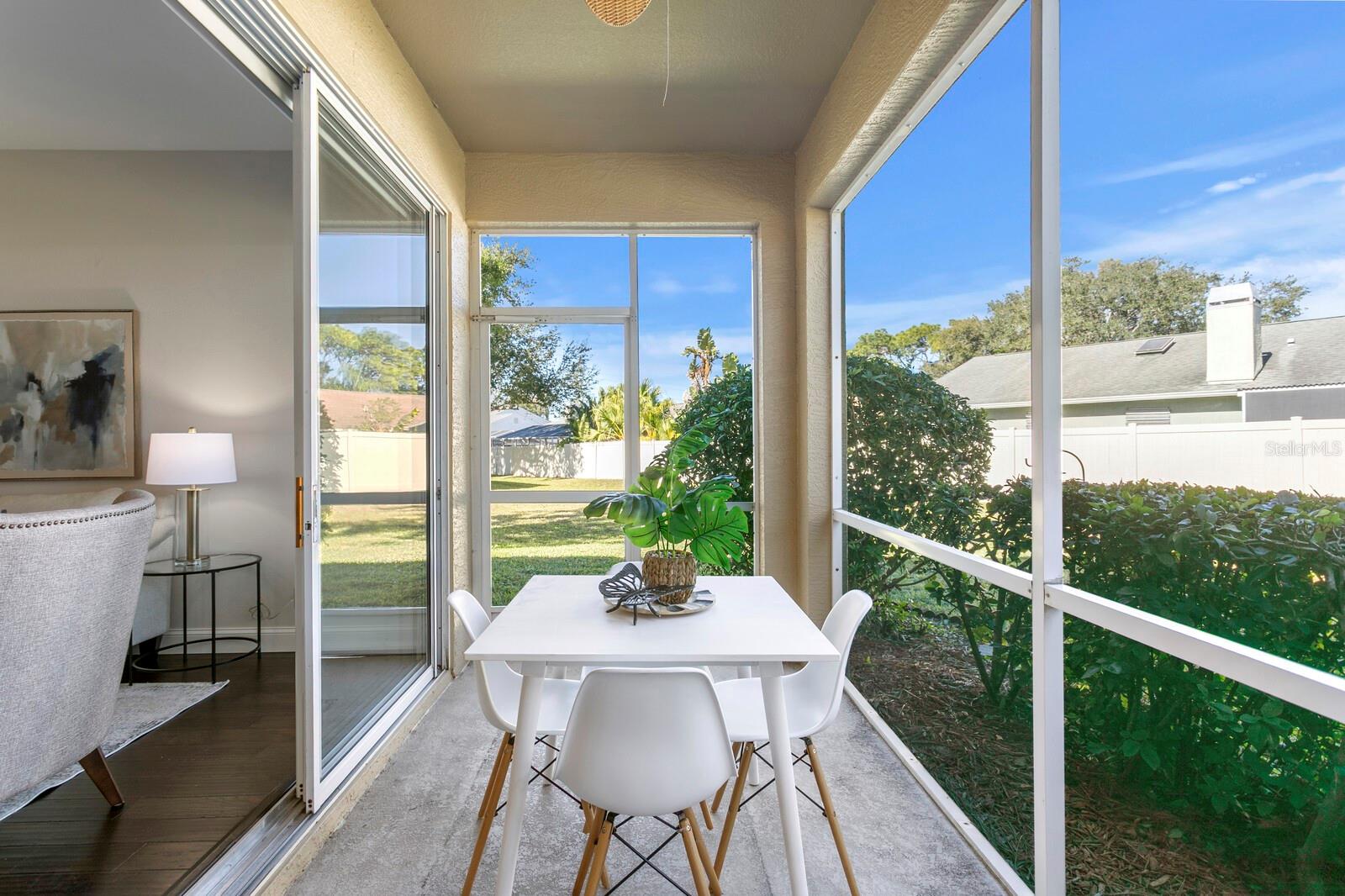 SCREENED-IN COVERED PATIO