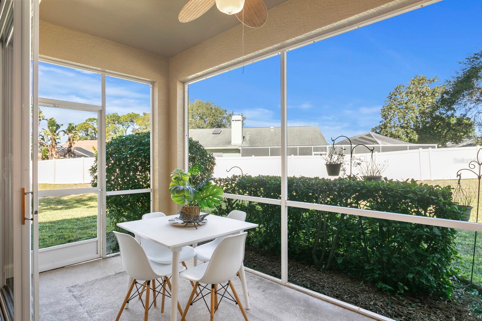 SCREENED-IN COVERED PATIO