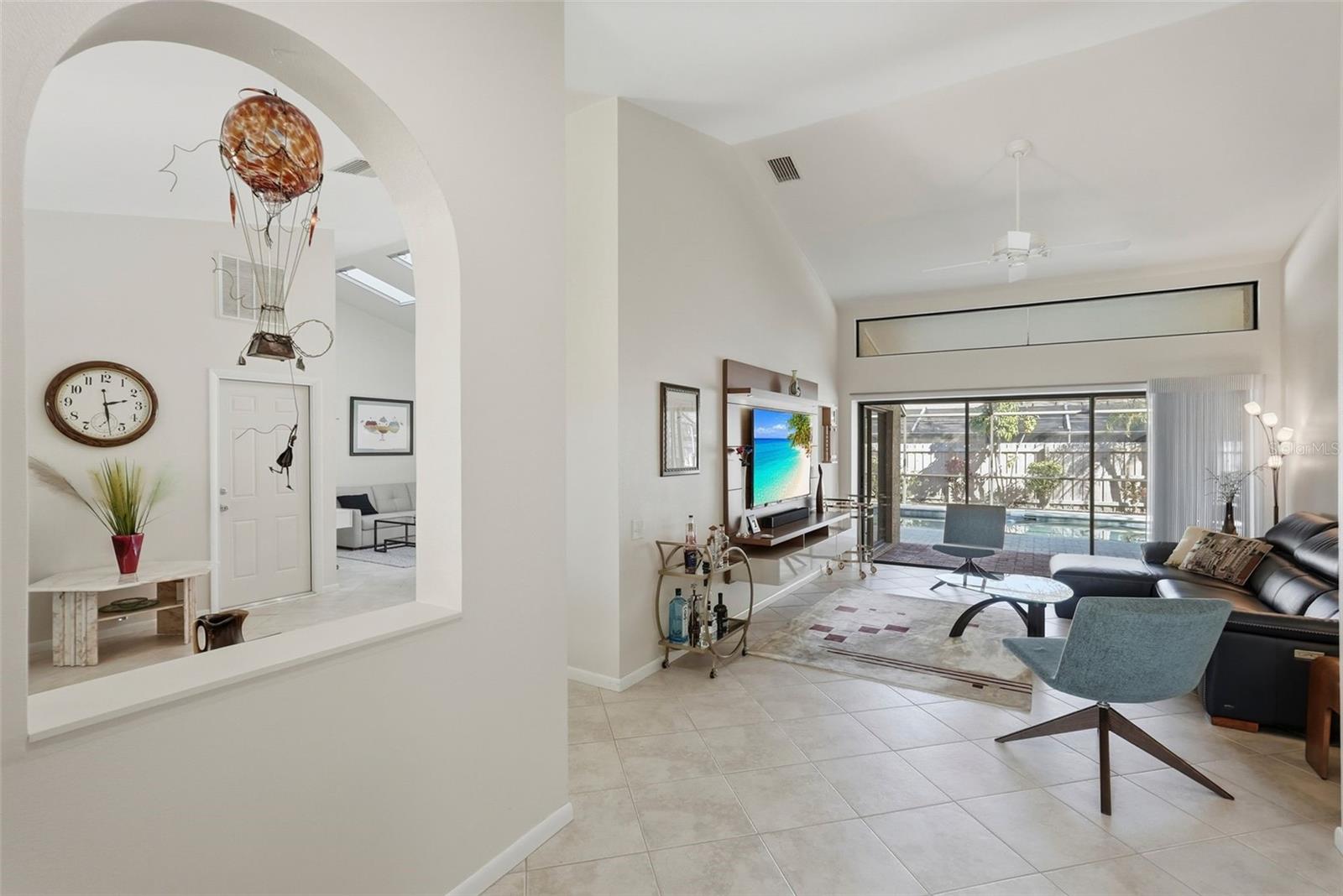 Another view of the front entrance looking into the living room area and dining room.