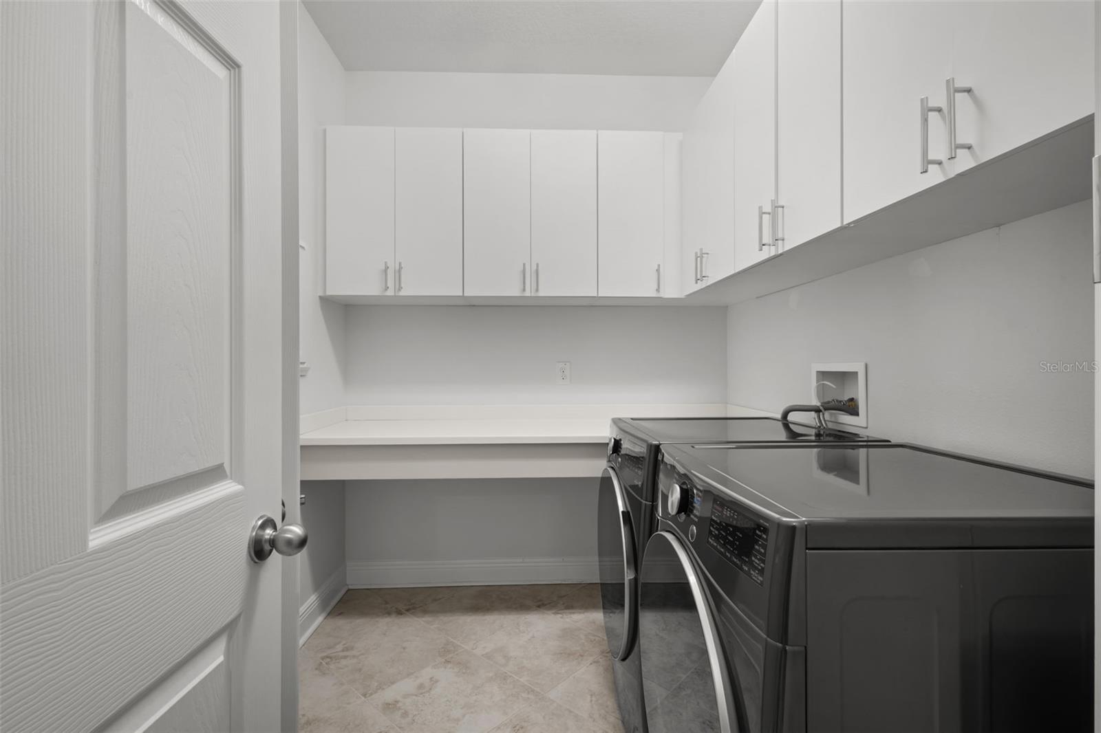 Laundry Room with Cabinets & Folding Counter