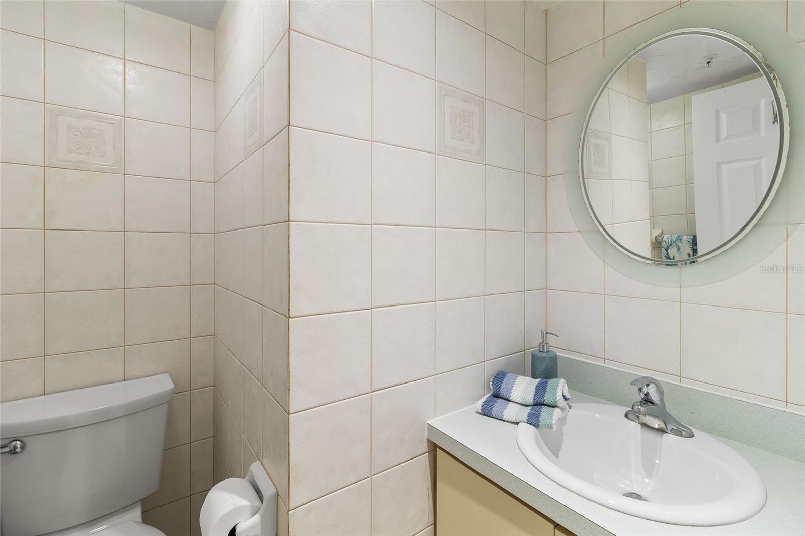 Half Bath in Hall by Laundry Room