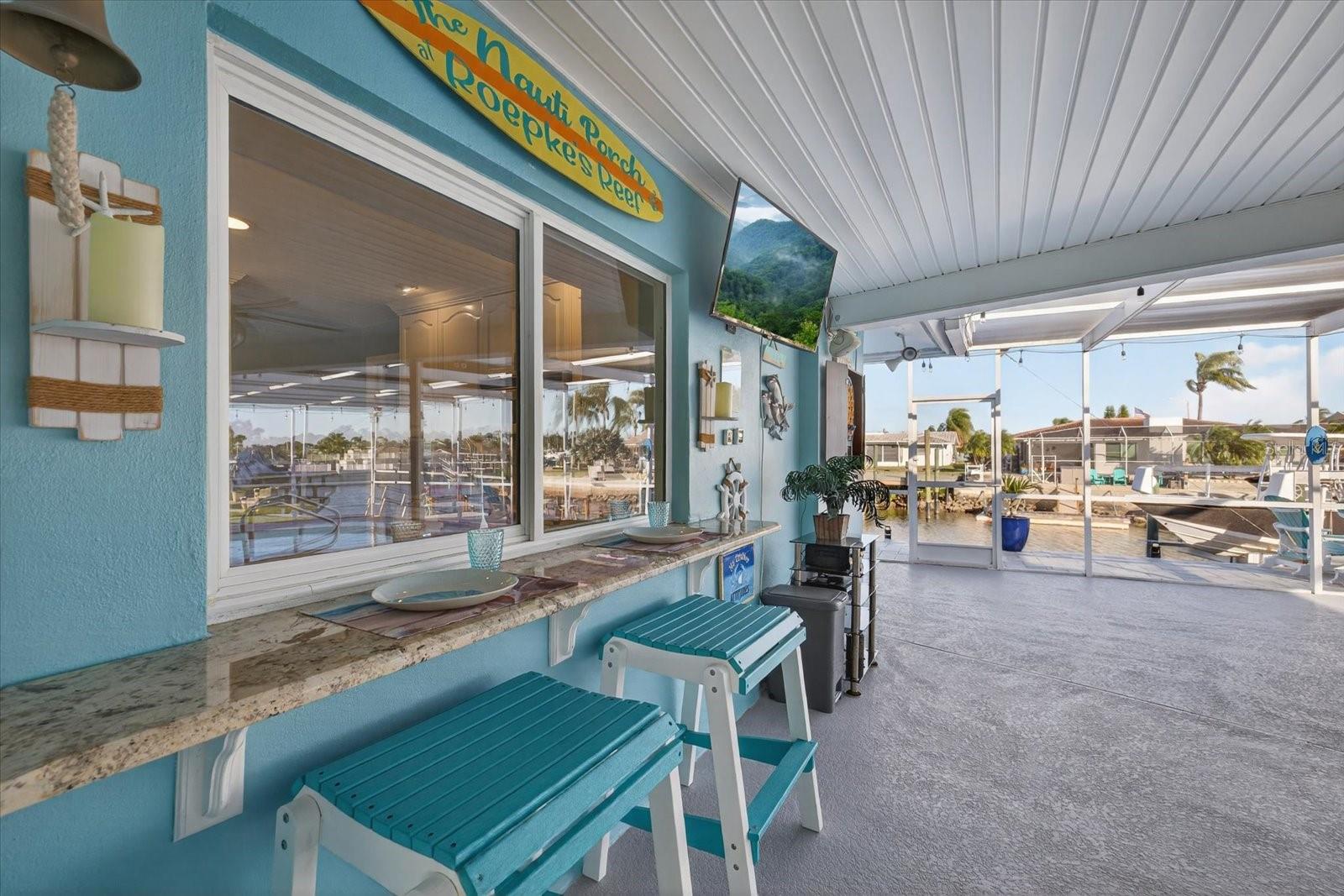 Covered pass through window