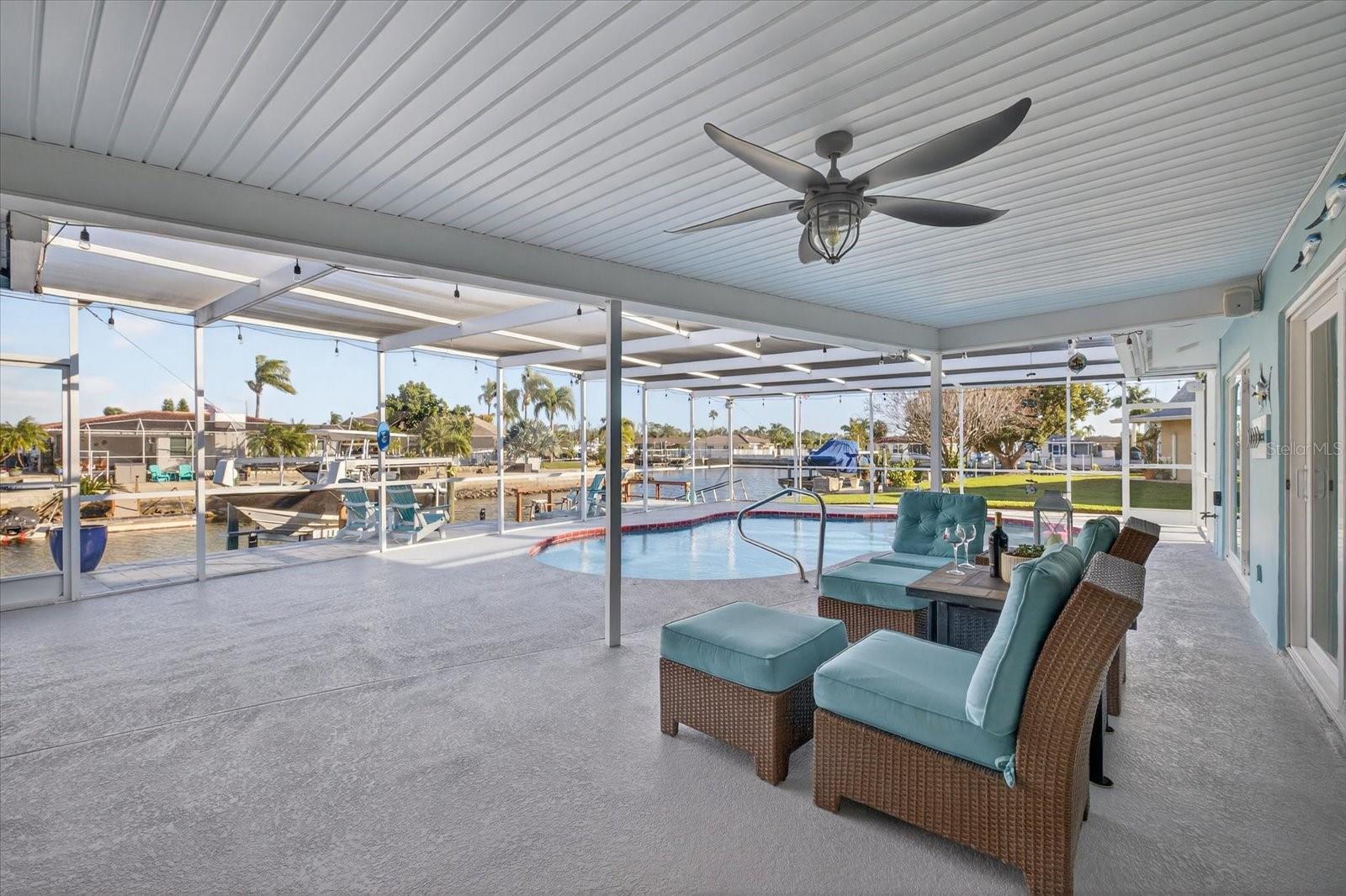 Covered outdoor lania and pool area