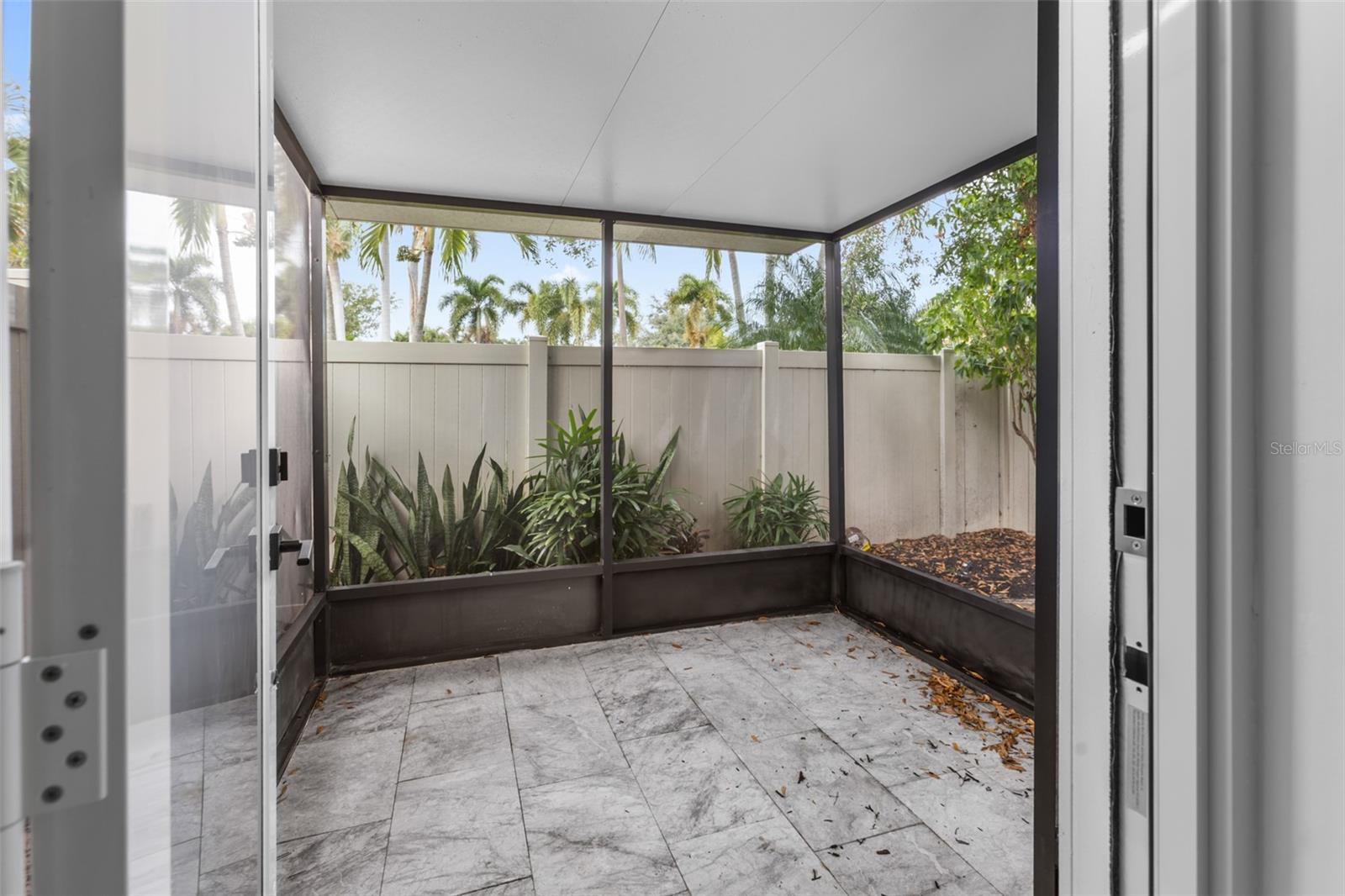 Private screened porch for bedroom 2