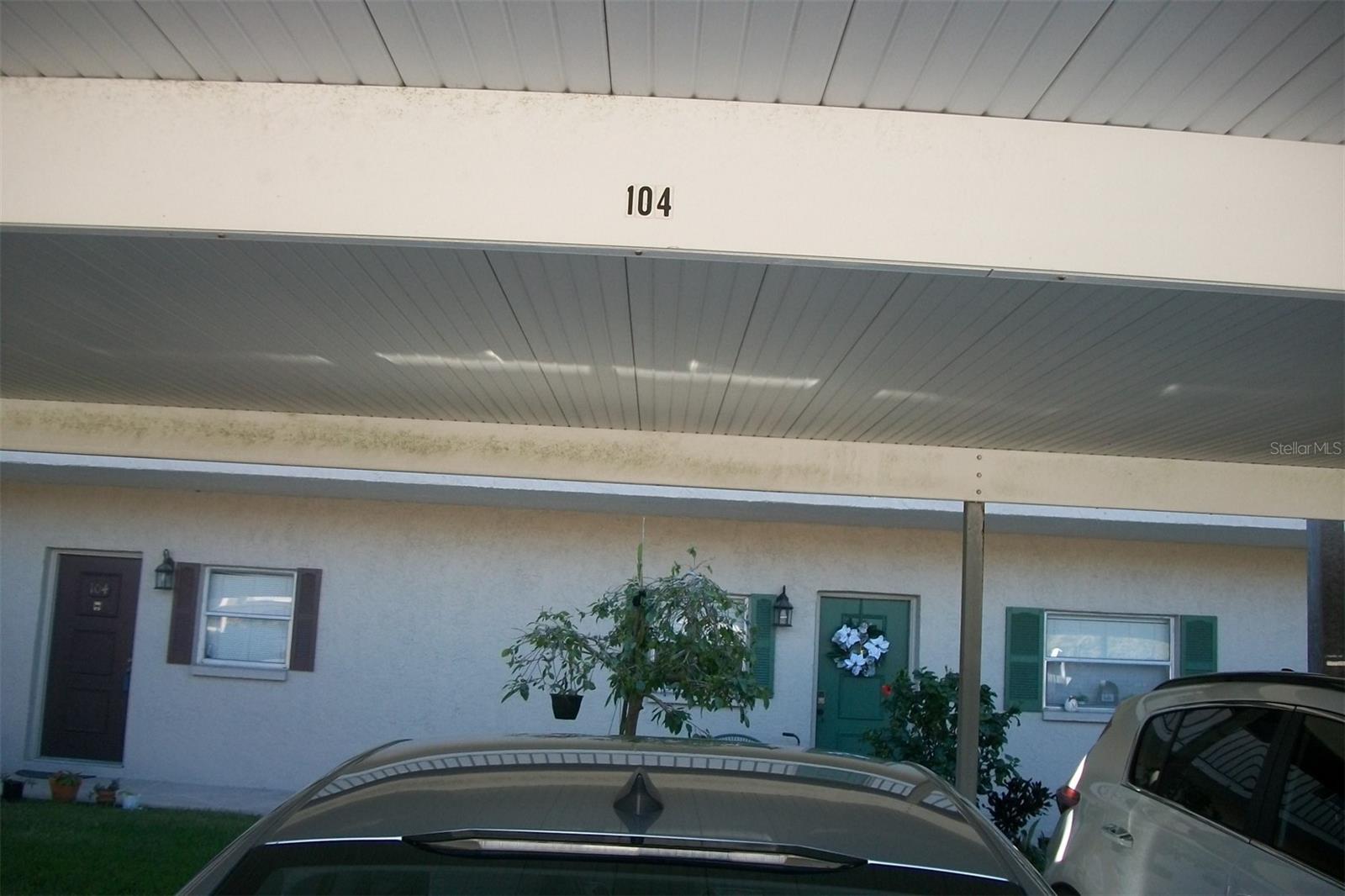 1 Car Carport in front of unit, unit door on the left, plus extra guest parking in community