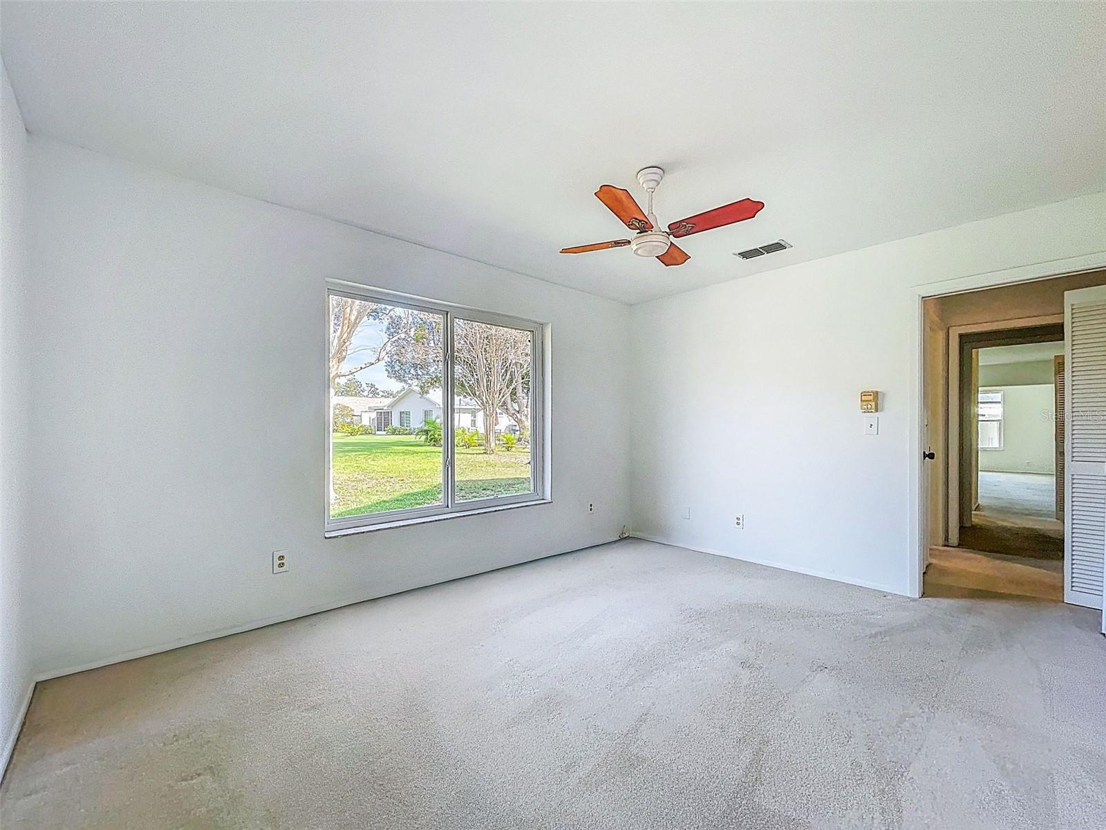 Bedroom 2 pocket door gives guests plenty of privacy with walk-in closet, and en-suite hallway bathroom