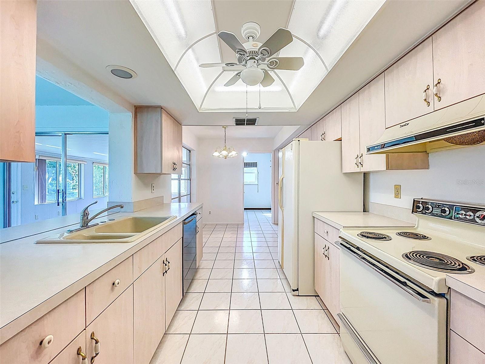 Galley kitchen with eat-in area and plenty of storage