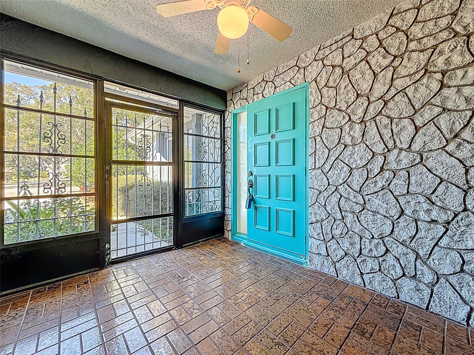 Large enclosed front porch.