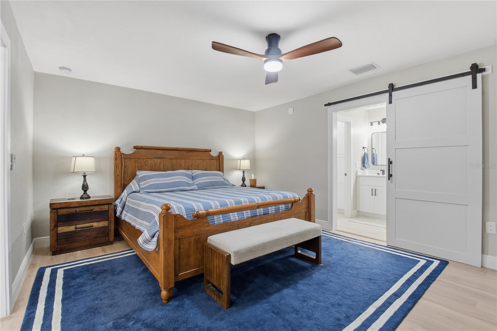 BARN DOOR IN THE PRIMARY BEDROOM!